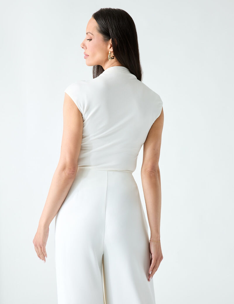 Sleeveless solid top