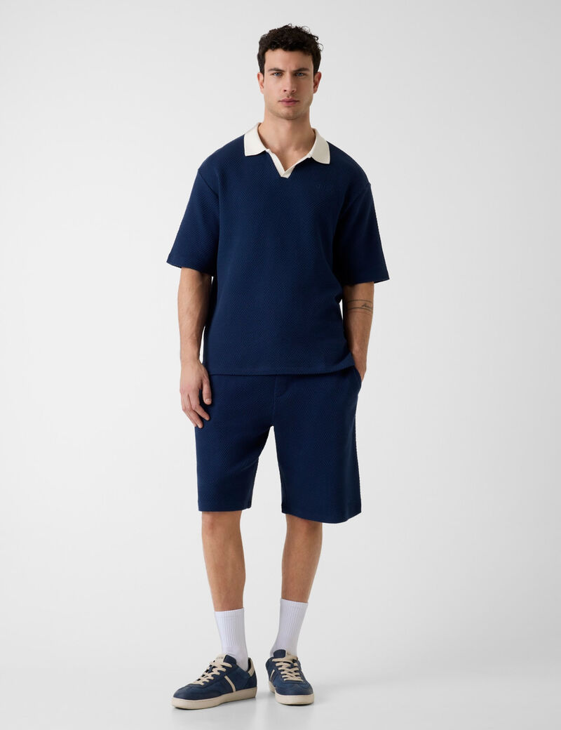 guess triangle logo polo