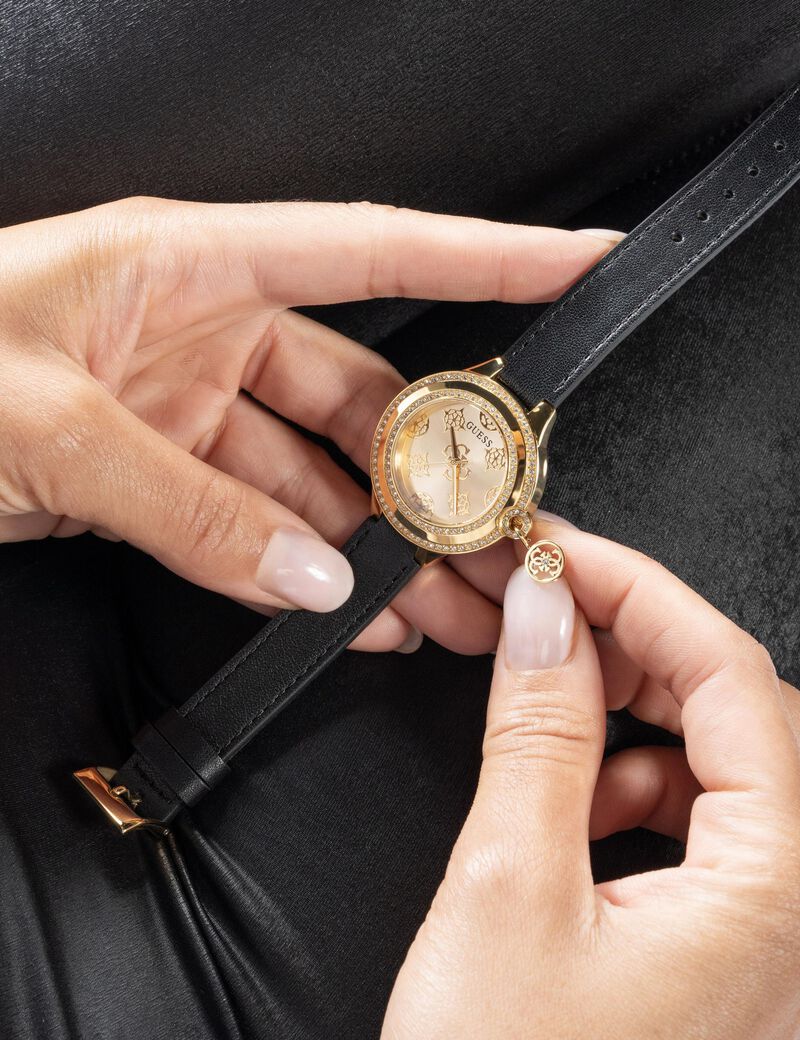 Analogue watch with pendant detail